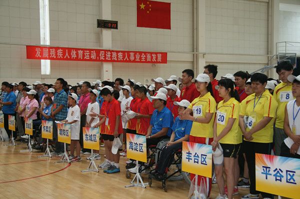 图片为：2012年北京市残疾人田径、游泳、乒乓球比赛运动队