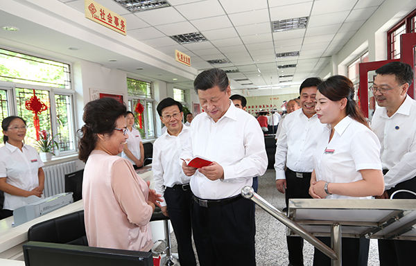 习近平：全面建成小康社会，残疾人一个也不能少
