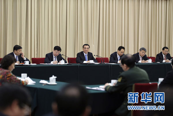 3月6日，中共中央政治局常委、国务院总理李克强参加十二届全国人大三次会议山东代表团的审议。 新华社记者丁林摄