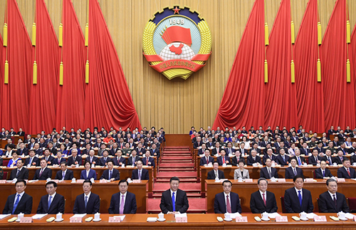 3月3日，中国人民政治协商会议第十三届全国委员会第一次会议在北京人民大会堂开幕。这是习近平、李克强、张德江、俞正声、张高丽、栗战书、王沪宁、赵乐际、韩正在主席台就座。新华社记者 李学仁 摄 